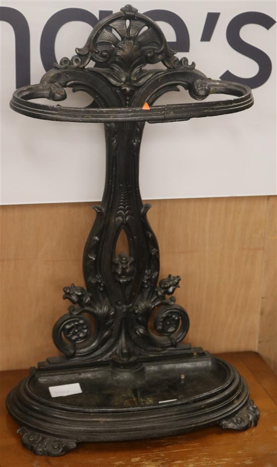 A Victorian black painted cast iron stick stand, W.42cm